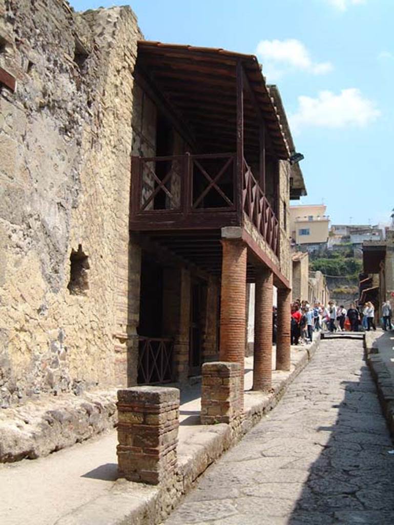 III.15 Herculaneum, on left. May 2001. Looking north along Cardo IV Inferiore.  
Photo courtesy of Current Archaeology.